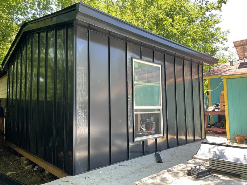 Black standing seam metal wall panels for Roof Inspection in Alcoa